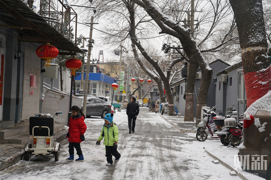 北京降雪节后“开工” 雪中京城银装素裹(2) 第2页